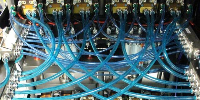 Laser burn-in rack and laser test station, blue wires crossing